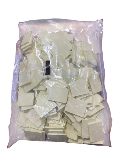 Tasselli per vetro 40x30 (Confezione da 1 kg.)
